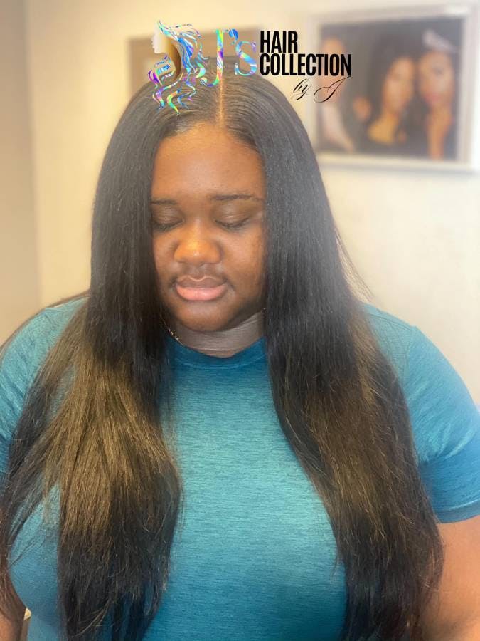picture of a black woman with beautiful black straight hair